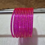 रानी कलर मे काँच की 12 चुडी