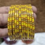 पिले कलर मे काँच की 12 चुडी A5